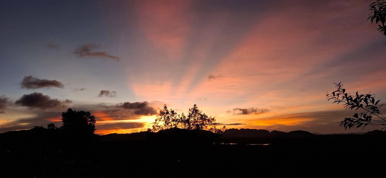 Warm sunset sky over the Koh Lanta hills